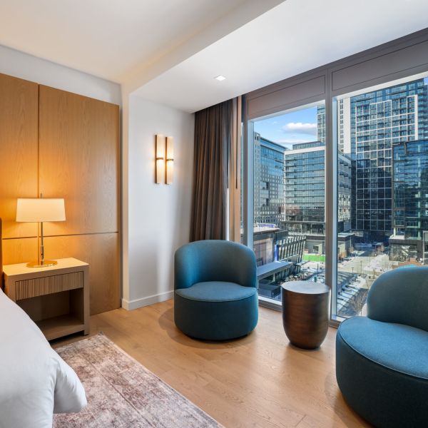 commercial boutique hotel room chairs with city view